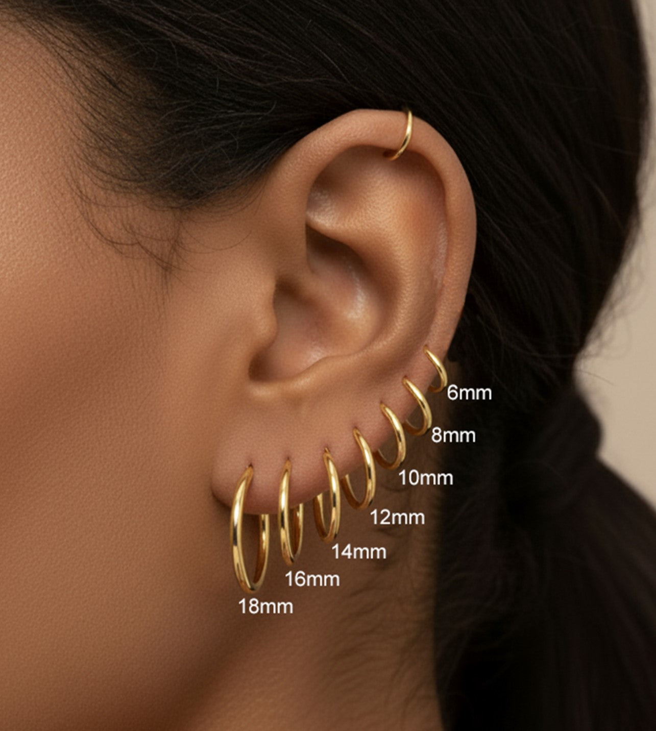 These handmade solid gold hoop earrings are designed for effortless everyday wear.