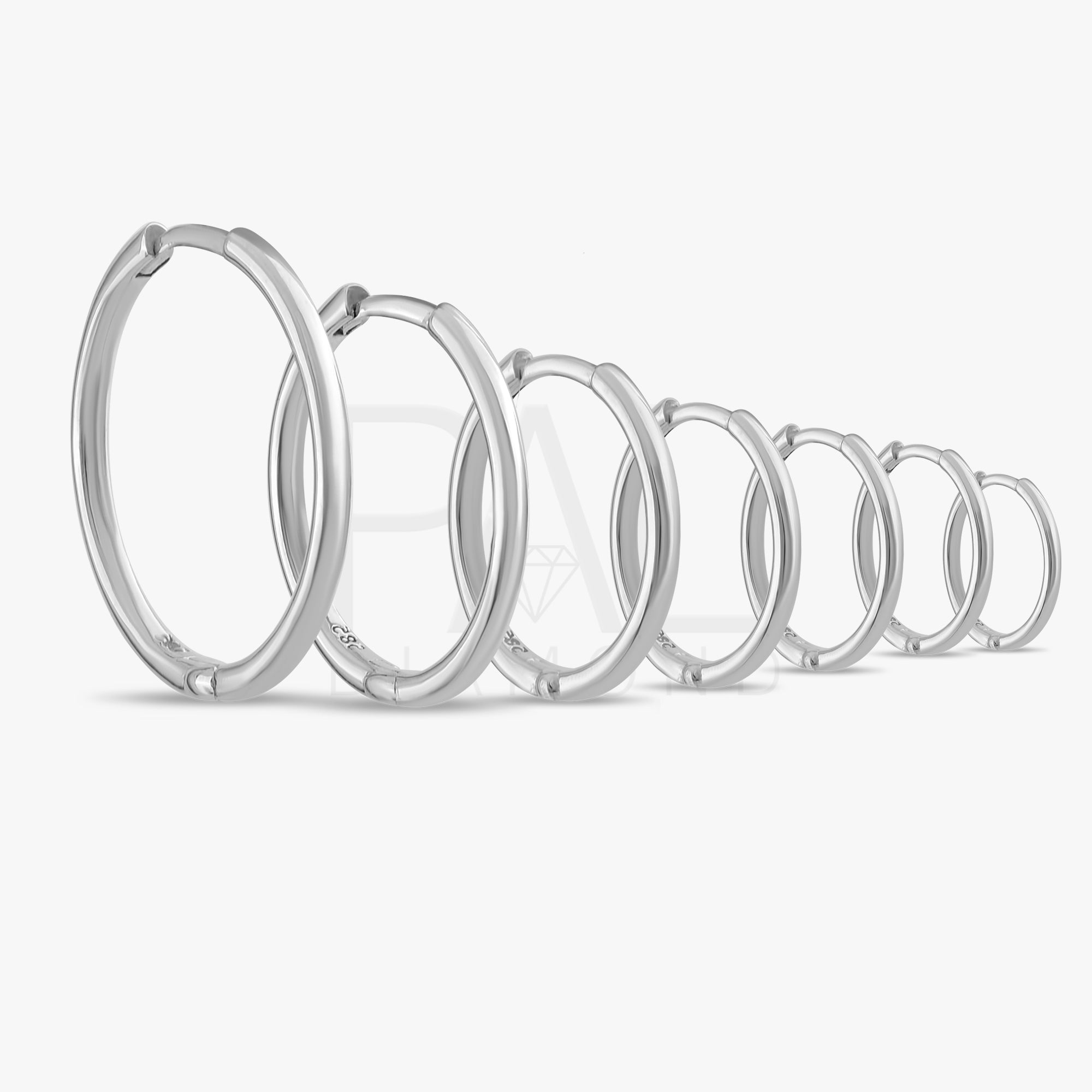 These handmade solid gold hoop earrings are designed for effortless everyday wear.